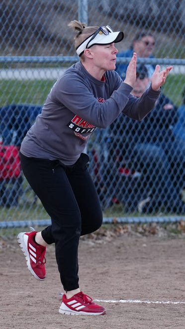Sussex Hamilton head coach Kaylee Gendrich applauds a play during the game at home against Divine Savior Holy Angels on Tuesday, April 9, 2024.